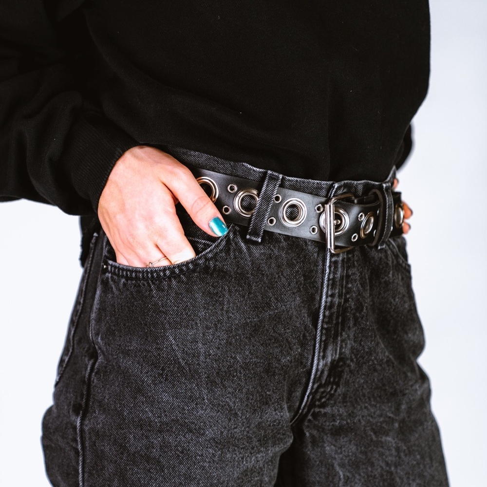 BLACK FAUX LEATHER BELT WITH SILVER GROMMET DETAIL